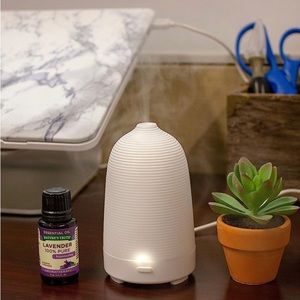 Mini diffuser with essential oils